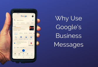 Hand holding phone using Google's Business Messages
